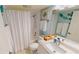 Clean bathroom with a bathtub, shower, and updated vanity at 3830 Bal Harbor Blvd # 5, Punta Gorda, FL 33950