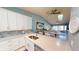 Modern kitchen with white cabinets and quartz countertops at 3830 Bal Harbor Blvd # 5, Punta Gorda, FL 33950