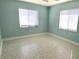 Bedroom featuring neutral tones and tiled floors at 3830 Bal Harbor Blvd # 5, Punta Gorda, FL 33950