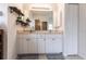 Double vanity bathroom with modern fixtures and shelving at 4398 Appleton Ter, North Port, FL 34286