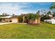 House exterior showcasing a two-car garage and landscaping at 4398 Appleton Ter, North Port, FL 34286