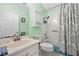 Bathroom featuring a bathtub, toilet and shower at 483 Winwood Ct, Port Charlotte, FL 33954