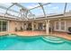 Relaxing screened-in pool and patio with plenty of space at 5273 Crestline Ter, Port Charlotte, FL 33981