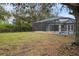 Large backyard with screened pool at 5452 Montego Ln, Port Charlotte, FL 33981