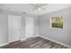 Spacious bedroom with wood-look floors and two closets at 5452 Montego Ln, Port Charlotte, FL 33981