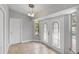 Bright dining area with French doors leading to the backyard at 5452 Montego Ln, Port Charlotte, FL 33981