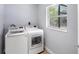 Bright laundry room with washer and dryer at 5452 Montego Ln, Port Charlotte, FL 33981