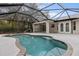 Relaxing pool and patio area with screened enclosure at 5452 Montego Ln, Port Charlotte, FL 33981