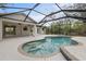 Inviting pool area with screened enclosure at 5452 Montego Ln, Port Charlotte, FL 33981