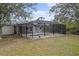 Inviting screened pool and patio area in backyard at 5452 Montego Ln, Port Charlotte, FL 33981