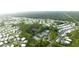 Aerial view of a large community with numerous homes and amenities at 6642 Acacia Ct, North Port, FL 34287