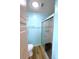 Bathroom with shower, toilet and light blue walls at 6642 Acacia Ct, North Port, FL 34287