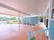 Covered carport with a view of the street and landscaping at 6642 Acacia Ct, North Port, FL 34287