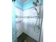 Walk-in shower with modern gray tile and glass enclosure at 6642 Acacia Ct, North Port, FL 34287