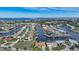 Property view showcasing canal front location and neighborhood at 720 Bimini Ln, Punta Gorda, FL 33950