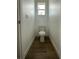 Small, well-lit half bathroom with a toilet and tile floor at 7274 Gewant Blvd, Punta Gorda, FL 33982