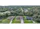 Aerial view showing three houses and their surroundings at 813 Thornton Nw Ave, Port Charlotte, FL 33948