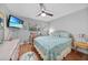 Primary bedroom with a king bed and ocean decor at 813 Thornton Nw Ave, Port Charlotte, FL 33948