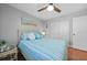 Bedroom with a queen bed and ceiling fan at 813 Thornton Nw Ave, Port Charlotte, FL 33948