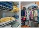 Well-organized closet with shelving and hanging rods at 813 Thornton Nw Ave, Port Charlotte, FL 33948