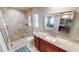Updated bathroom with granite vanity and walk-in shower at 1022 Lucia Dr, Punta Gorda, FL 33950