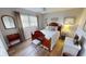 Charming bedroom with antique bed, wood floors, and window coverings at 1022 Lucia Dr, Punta Gorda, FL 33950
