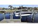 Private boat lift with easy access to the water at 1022 Lucia Dr, Punta Gorda, FL 33950