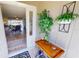 Open door reveals a view into the living room with hardwood floors and a sitting area at 1022 Lucia Dr, Punta Gorda, FL 33950