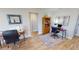 Bright home office with built-in shelving and hardwood floors at 1022 Lucia Dr, Punta Gorda, FL 33950