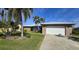Single story home with attached garage and curb appeal at 1022 Lucia Dr, Punta Gorda, FL 33950