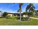 Single-story home with mature landscaping at 1022 Lucia Dr, Punta Gorda, FL 33950