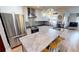 Modern kitchen with stainless steel appliances and a large island with seating at 1022 Lucia Dr, Punta Gorda, FL 33950