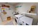 Bright laundry room with shelving and lots of storage at 1022 Lucia Dr, Punta Gorda, FL 33950