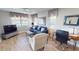 Comfortable living room with hardwood floors and a cozy sitting area at 1022 Lucia Dr, Punta Gorda, FL 33950