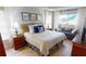 Spacious bedroom with hardwood floors and a built-in sitting area at 1022 Lucia Dr, Punta Gorda, FL 33950