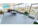 Relaxing screened patio overlooking a canal with seating at 1022 Lucia Dr, Punta Gorda, FL 33950