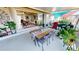 Outdoor patio with table, chairs, and view into living area at 1022 Lucia Dr, Punta Gorda, FL 33950