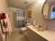Bathroom with shower/tub combo and vanity at 1051 Forrest Nelson Blvd # A-104, Port Charlotte, FL 33952