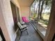 Relaxing screened porch with seating at 1051 Forrest Nelson Blvd # A-104, Port Charlotte, FL 33952