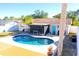 Inviting kidney-shaped pool with spacious deck at 1063 Elaine St, Venice, FL 34285