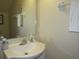 Clean bathroom with a vanity sink and mirror at 1246 Rio De Janeiro Ave # 503, Punta Gorda, FL 33983