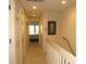 Upstairs hallway with access to bedrooms and bath at 1246 Rio De Janeiro Ave # 503, Punta Gorda, FL 33983
