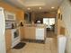 Well-equipped kitchen with white appliances at 1246 Rio De Janeiro Ave # 503, Punta Gorda, FL 33983