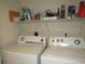 Laundry room with washer and dryer, shelving at 1246 Rio De Janeiro Ave # 503, Punta Gorda, FL 33983