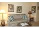 Living room with sofa and two end tables at 1246 Rio De Janeiro Ave # 503, Punta Gorda, FL 33983