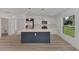 Open concept kitchen with island and stainless steel appliances at 1325 Goshen Rd, North Port, FL 34288