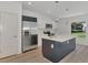 Modern kitchen with stainless steel appliances and an island at 1325 Goshen Rd, North Port, FL 34288