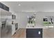 Modern kitchen with stainless steel appliances and white cabinets at 1325 Goshen Rd, North Port, FL 34288
