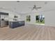 Open floor plan combining kitchen and living area at 1325 Goshen Rd, North Port, FL 34288