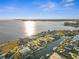 Aerial view of waterfront home with private dock at 136 Creek Se Dr, Port Charlotte, FL 33952